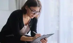 social worker making notesvalerii honcharuk adobestock 302389524