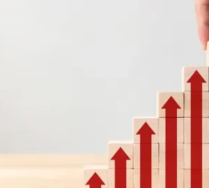 towers of wooden blocks with upward pointing arrows of increasing height monster ztudio adobestock 266136202