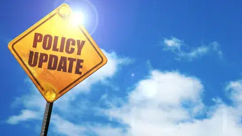 sign saying policy update argus adobestock 138566941